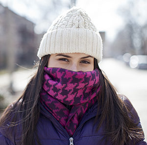 Woman wearing winter scarf over nose and mouth. SOURCE: Original photo. Used in 88795.